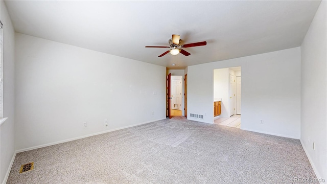 2314 Flagstaff Dr, Longmont, CO 80504 - spare room with ceiling fan, light carpet, and baseboards