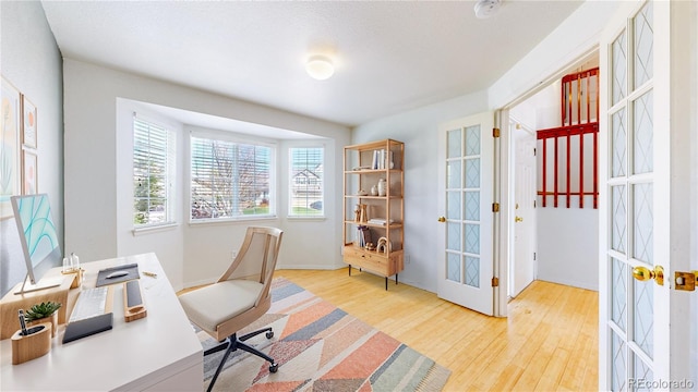2314 Flagstaff Dr, Longmont, CO 80504 - office space with french doors and wood finished floors