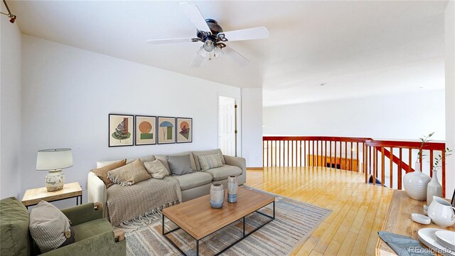 2314 Flagstaff Dr, Longmont, CO 80504 - living room featuring ceiling fan and hardwood / wood-style flooring