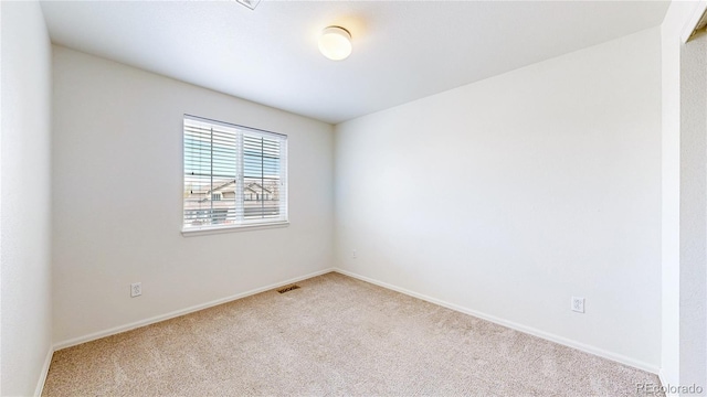 2314 Flagstaff Dr, Longmont, CO 80504 - spare room with carpet floors and baseboards