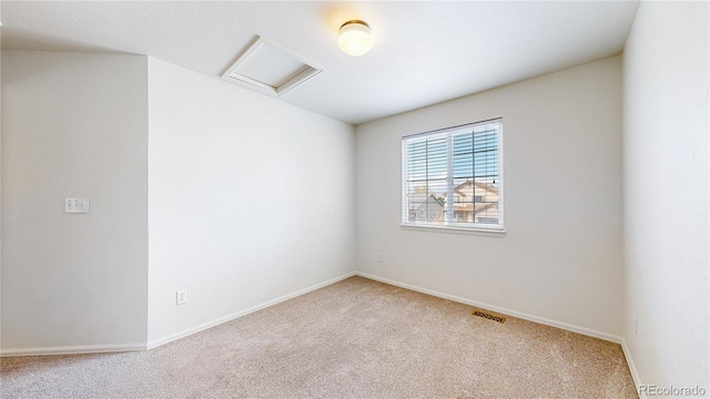 2314 Flagstaff Dr, Longmont, CO 80504 - empty room featuring carpet, attic access, and baseboards
