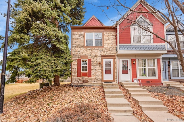 view of property featuring stone siding