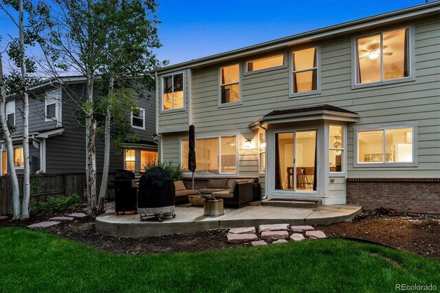1441 Cherry Pl, Erie, CO 80516 - rear view of property featuring an outdoor living space and a patio