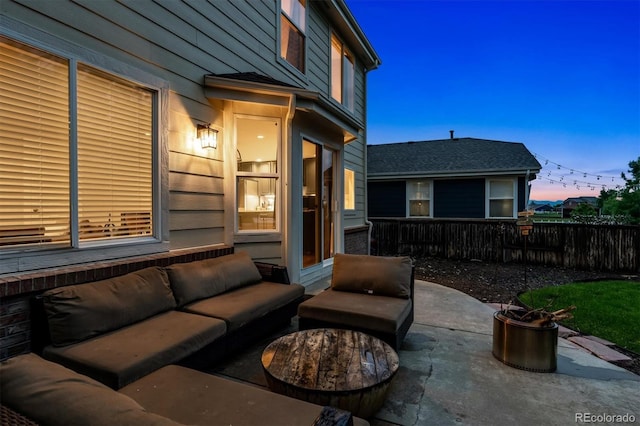 1441 Cherry Pl, Erie, CO 80516 - patio terrace at dusk with an outdoor hangout area and a patio