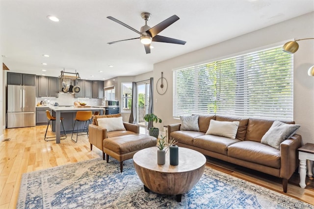 1441 Cherry Pl, Erie, CO 80516 - living room featuring ceiling fan, light wood finished floors, and recessed lighting
