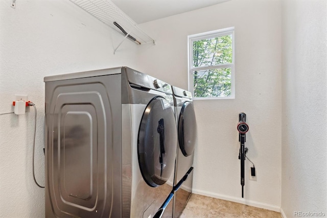 1441 Cherry Pl, Erie, CO 80516 - washroom with separate washer and dryer and baseboards