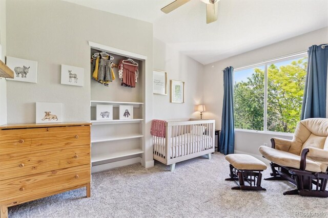 1441 Cherry Pl, Erie, CO 80516 - bedroom with carpet flooring, a crib, and ceiling fan