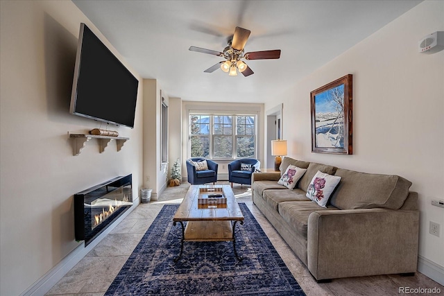 living room featuring ceiling fan