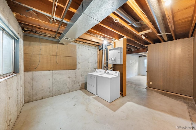 basement with independent washer and dryer and a wealth of natural light