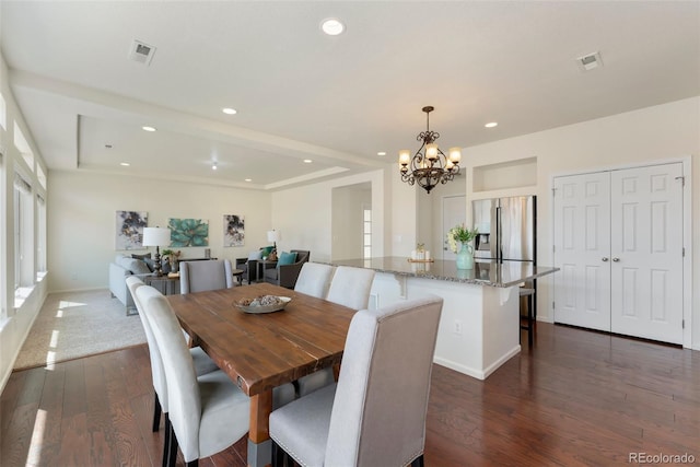dining room featuring a notable chandelier, baseboards, recessed lighting, dark wood-style floors, and visible vents