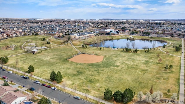 aerial view featuring a water view and a residential view