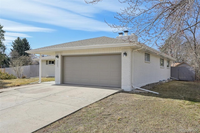 exterior space with fence and driveway