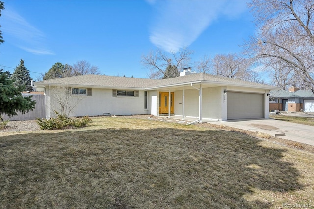 ranch-style home with fence, a front yard, a chimney, a garage, and driveway