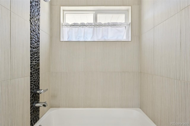 bathroom with shower / bathing tub combination