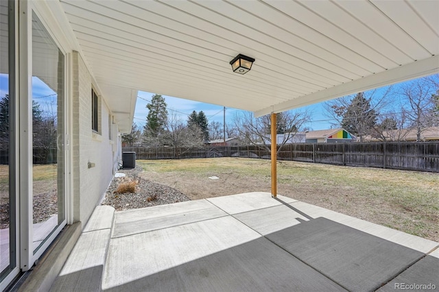 view of patio / terrace with central AC and a fenced backyard