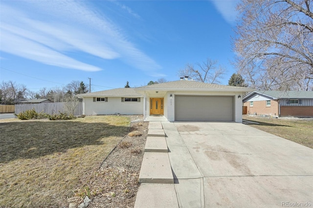 single story home with a front yard, fence, driveway, an attached garage, and stucco siding