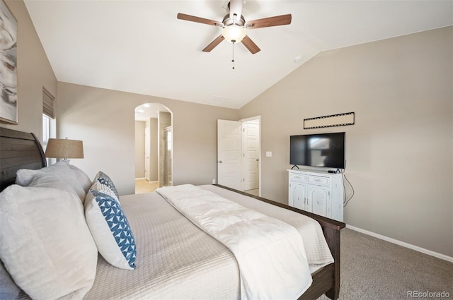 bedroom with baseboards, lofted ceiling, carpet flooring, arched walkways, and a ceiling fan