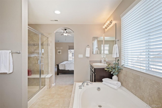 full bathroom with visible vents, a garden tub, a stall shower, tile patterned flooring, and ceiling fan