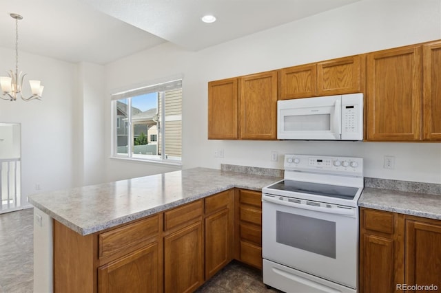 719 Elk Mountain Dr, Severance, CO 80550 - kitchen featuring white appliances, a peninsula, a chandelier, and brown cabinetry