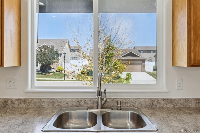 719 Elk Mountain Dr, Severance, CO 80550 - kitchen view of a sink and light countertops