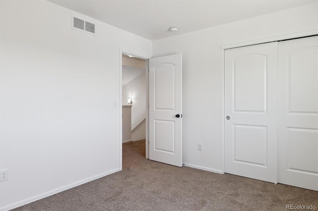 719 Elk Mountain Dr, Severance, CO 80550 - unfurnished bedroom featuring carpet, a closet, and baseboards