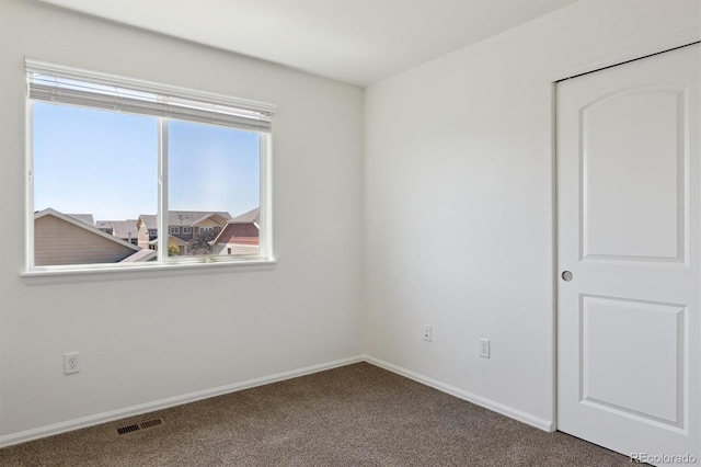 719 Elk Mountain Dr, Severance, CO 80550 - empty room featuring carpet and baseboards