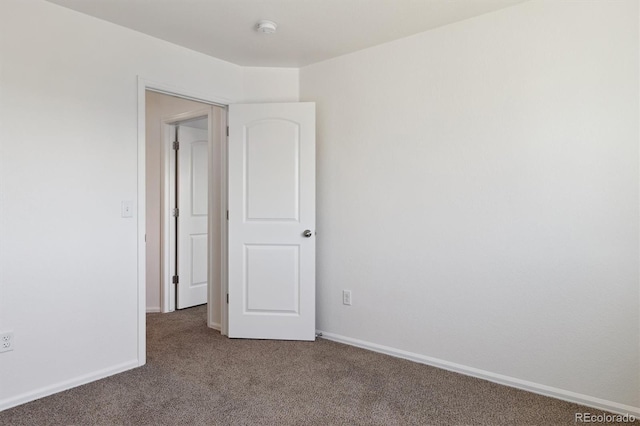 719 Elk Mountain Dr, Severance, CO 80550 - carpeted empty room with a smoke detector and baseboards