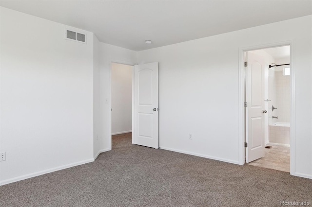 719 Elk Mountain Dr, Severance, CO 80550 - unfurnished bedroom with carpet, baseboards, and ensuite bathroom