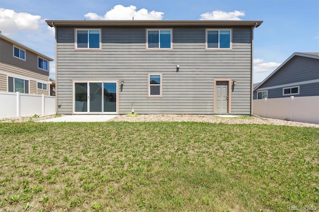 719 Elk Mountain Dr, Severance, CO 80550 - rear view of property with a patio