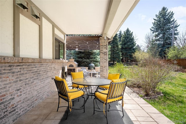 view of patio with outdoor dining area