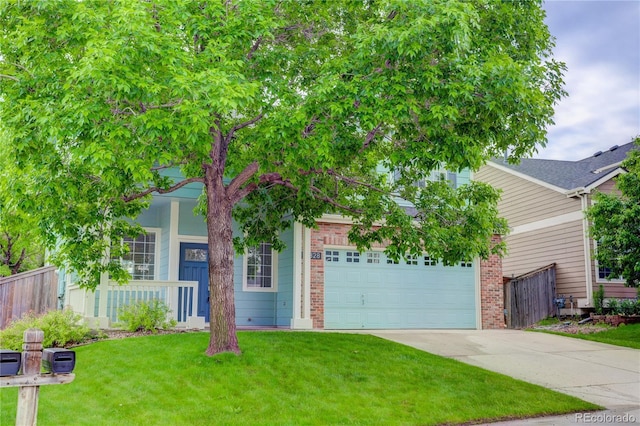 15828 Greenstone Ln, Parker, CO 80134 - view of property hidden behind natural elements with driveway, an attached garage, and brick siding