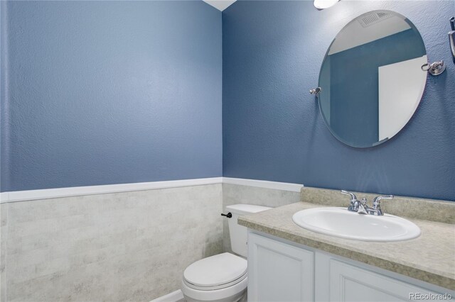 15828 Greenstone Ln, Parker, CO 80134 - half bathroom with vanity and toilet