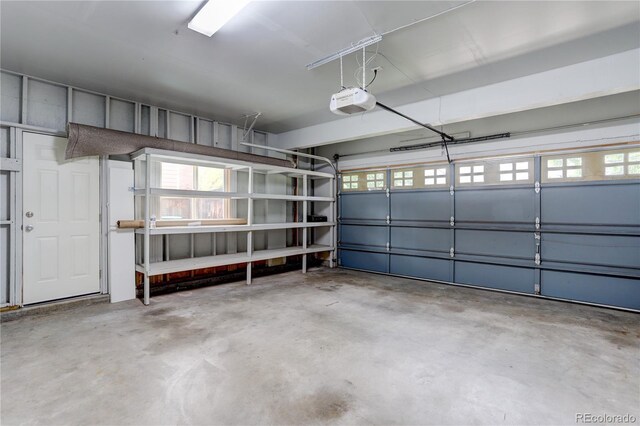 15828 Greenstone Ln, Parker, CO 80134 - garage featuring a garage door opener