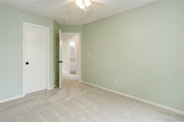 15828 Greenstone Ln, Parker, CO 80134 - unfurnished bedroom with light colored carpet, baseboards, a ceiling fan, and a closet