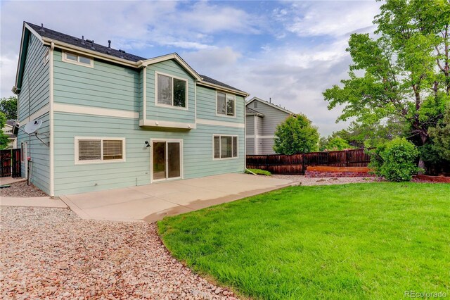 15828 Greenstone Ln, Parker, CO 80134 - rear view of property with a patio area