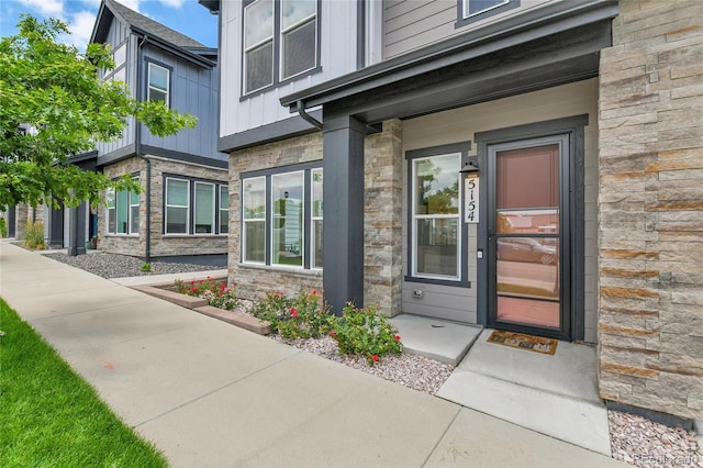 5154 Taft Ct, Wheat Ridge, CO 80033 - view of exterior entry with stone siding and board and batten siding
