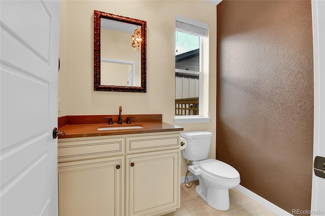 5154 Taft Ct, Wheat Ridge, CO 80033 - half bathroom featuring vanity and tile patterned floors
