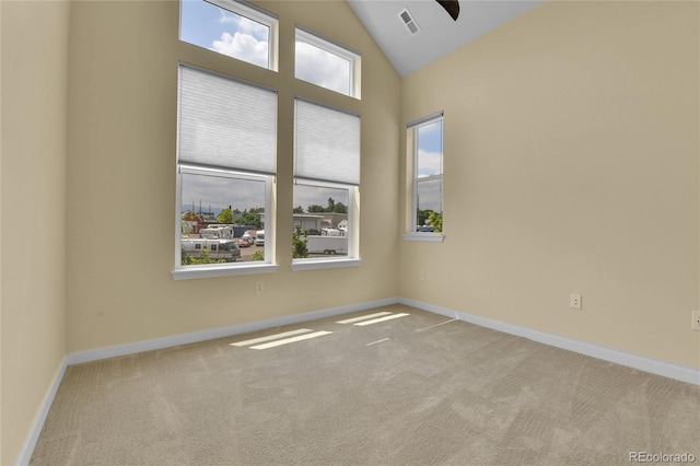 5154 Taft Ct, Wheat Ridge, CO 80033 - spare room with carpet floors, vaulted ceiling, and ceiling fan