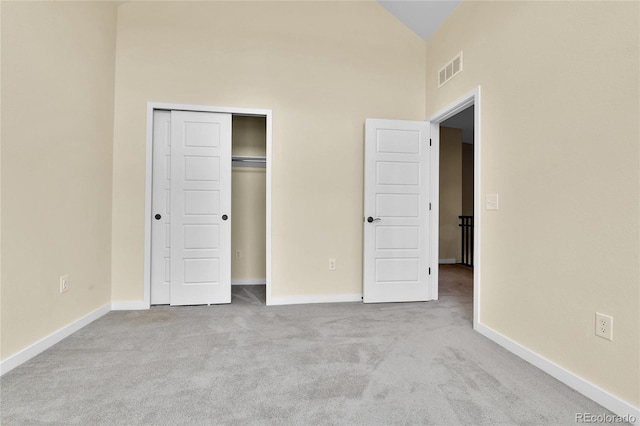 5154 Taft Ct, Wheat Ridge, CO 80033 - unfurnished bedroom with high vaulted ceiling, carpet flooring, and a closet