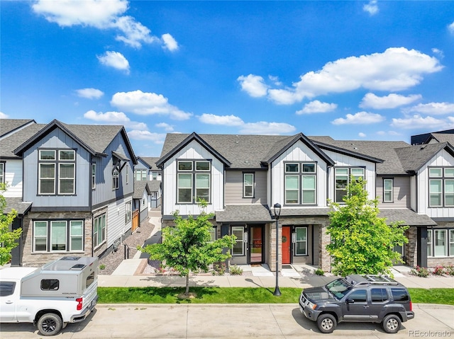 5154 Taft Ct, Wheat Ridge, CO 80033 - view of property with a residential view, board and batten siding, and a shingled roof
