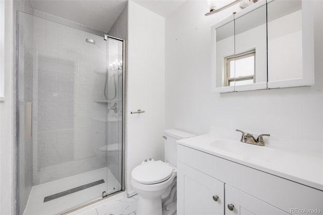 1549 S Evanston St, Aurora, CO 80012 - bathroom featuring toilet, vanity, a shower stall, and marble finish floors