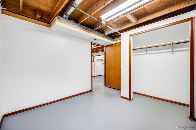 1549 S Evanston St, Aurora, CO 80012 - unfurnished bedroom with concrete floors and a closet
