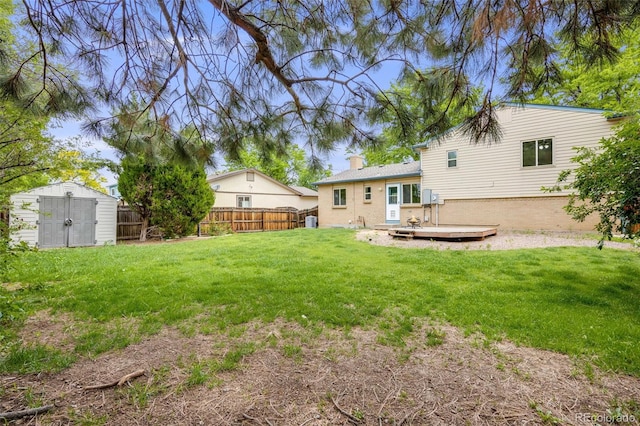 1549 S Evanston St, Aurora, CO 80012 - view of yard with a wooden deck