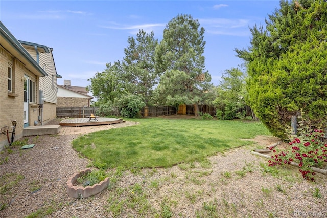 1549 S Evanston St, Aurora, CO 80012 - view of yard featuring a wooden deck