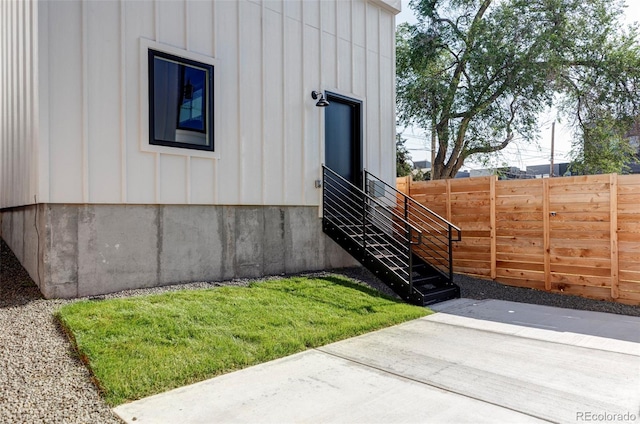 3435 W 17th Ave, Denver, CO 80204 - view of side of property featuring a patio area and board and batten siding