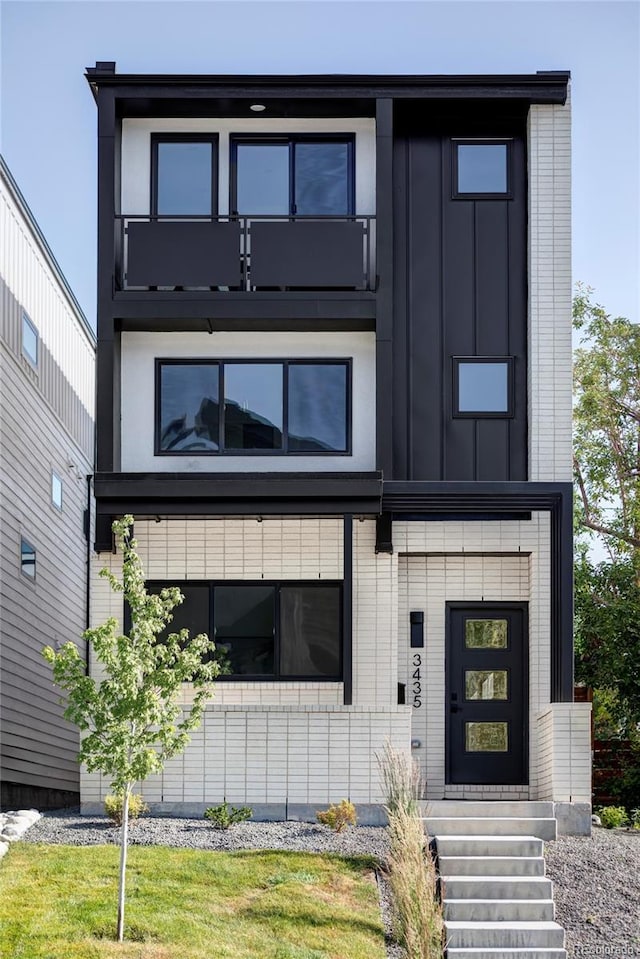 3435 W 17th Ave, Denver, CO 80204 - contemporary home featuring board and batten siding