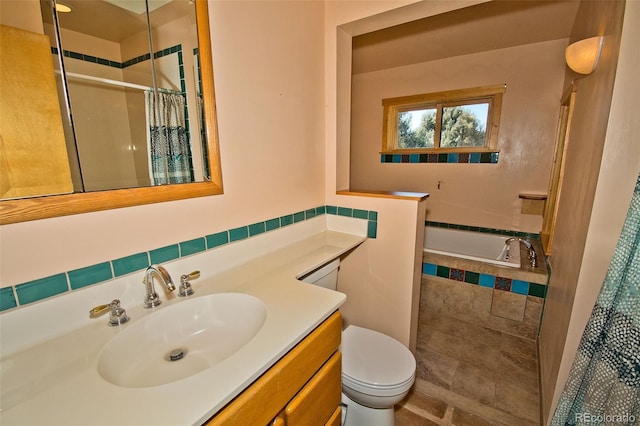1507 Wagon Wheel Rd, Crestone, CO 81131 - full bath with curtained shower, a relaxing tiled tub, toilet, and vanity