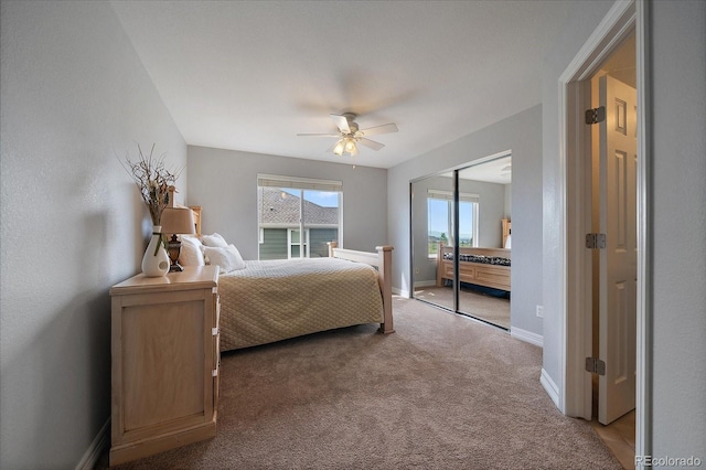 11691 Riverdale Dr, Parker, CO 80138 - bedroom featuring light carpet, a closet, and a ceiling fan