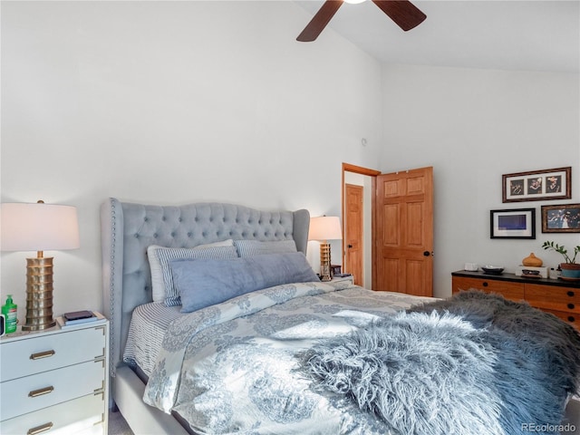 bedroom featuring high vaulted ceiling and a ceiling fan