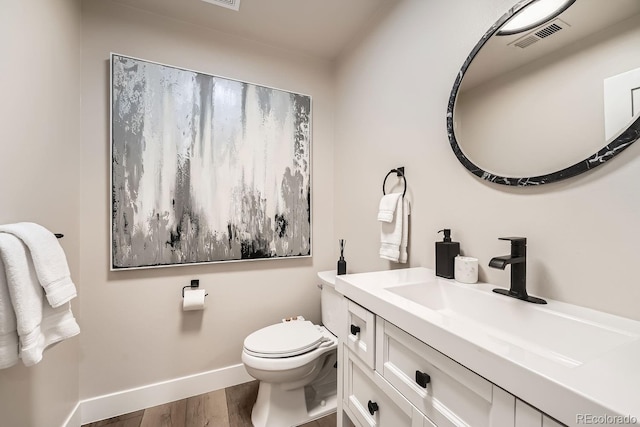 6443 S Florence Way, Englewood, CO 80111 - half bath with wood finished floors and vanity